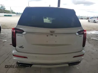 2023 Cadillac XT6 FWD Premium Luxury with VIN 1GYKPCRS4PZ103819, listed as a Copart auction lot 76279704 with 19,601 mi miles and Clean Title. Bid and sale history available at carsss.com. Image 6.