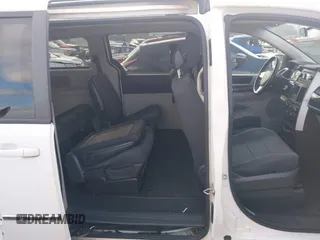 2010 Dodge Grand Caravan SXT with VIN 2D4RN5D17AR444818, listed as a IAAI auction lot 40941591 with Not Provided miles and . Bid and sale history available at DreamBid. Image 8.