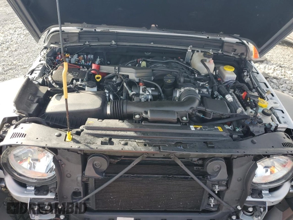 2023 Jeep Wrangler Willys with VIN 1C4HJXDG2PW671483, listed as a Copart auction lot 46990395 with 15,087 mi miles and Salvage Title. Bid and sale history available at DreamBid. Image 12.