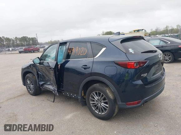 2017 Mazda CX-5 Touring with VIN JM3KFBCL9H0163449, listed as a IAAI auction lot 41919020 with 102,898 mi miles. Bid and sale history available at carsss.com. Image 3.