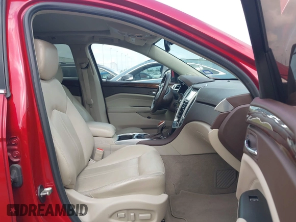 2014 Cadillac SRX Luxury Collection z VIN 3GYFNBE39ES576335, wystawiony jako IAAI lot #42093334 z przebiegiem 69 804 mil mil oraz . Historia ofert i sprzedaży dostępna na DreamBid. Obrazek 5.