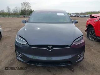 2019 Tesla Model X 75D with VIN 5YJXCDE24KF152150, listed as a IAAI auction lot 42015311 with 1 mi miles. Bid and sale history available at carsss.com. Image 6.