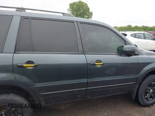 2005 Honda Pilot EX-L z VIN 5FNYF18585B063041, wystawiony jako IAAI lot #42267835 z przebiegiem 206 067 mil mil oraz . Historia ofert i sprzedaży dostępna na DreamBid. Obrazek 14.