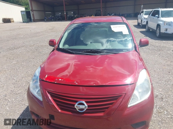 2012 Nissan Versa SV with VIN 3N1CN7AP7CL816930, listed as a IAAI auction lot 42070938 with 116,541 mi miles. Bid and sale history available at carsss.com. Image 6.
