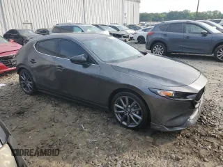 2019 Mazda 3 with VIN JM1BPAJMXK1119912, listed as a Copart auction lot 59708825 with 50,459 mi miles and Salvage title. Bid and sale history available at DreamBid. Image 4.