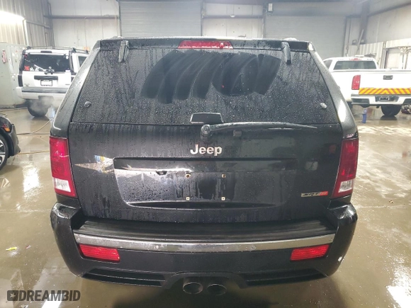 2007 Jeep Grand Cherokee SRT-8 with VIN 1J8HR78377C512937, listed as a Copart auction lot 83219784 with 158,485 mi miles and Salvage Title. Bid and sale history available at carsss.com. Image 6.