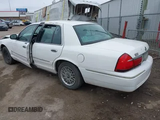 2001 Mercury Grand Marquis GS z VIN 2MEFM74W81X612809, wystawiony jako IAAI lot #41697200 z przebiegiem 160 423 mil mil oraz . Historia ofert i sprzedaży dostępna na DreamBid. Obrazek 3.
