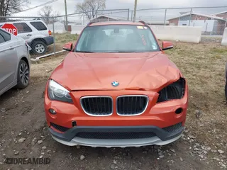 2015 BMW X1 xDrive28i with VIN WBAVL1C50FVY41206, listed as a IAAI auction lot 41508136 with 102,725 mi miles. Bid and sale history available at carsss.com. Image 12.