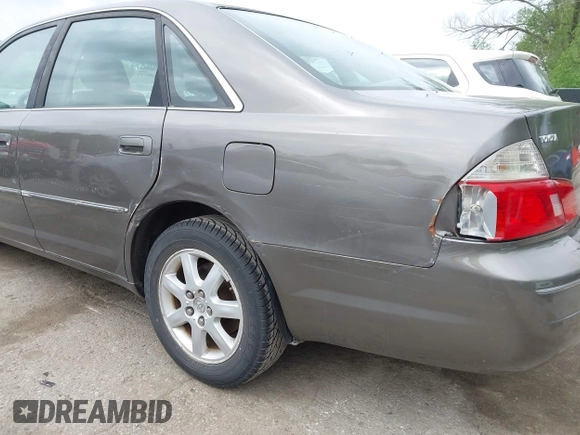 2003 Toyota Avalon XL with VIN 4T1BF28B53U285411, listed as a IAAI auction lot 42140722 with 282,407 mi miles and . Bid and sale history available at carsss.com. Image 12.