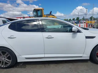2013 Kia Optima SX with VIN 5XXGR4A65DG194141, listed as a IAAI auction lot 42261444 with 167,918 mi miles and . Bid and sale history available at DreamBid. Image 12.