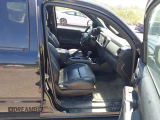 2019 Toyota Tacoma SR with VIN 5TFCZ5AN4KX208354, listed as a IAAI auction lot 42771410 with 77,509 mi miles and . Bid and sale history available at DreamBid. Image 5.