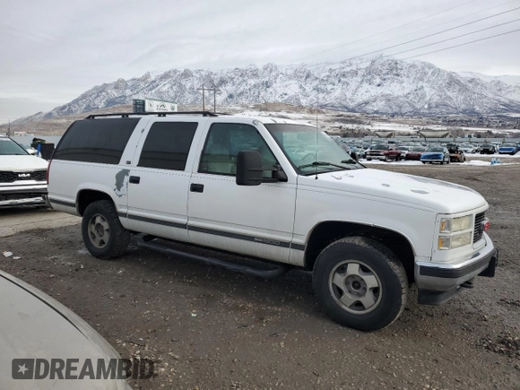 1997 GMC Suburban with VIN 3GKFK16RXVG501646, listed as a Copart auction lot 45849265 with 301,974 mi miles and Clean title. Bid and sale history available at DreamBid. Image 4.