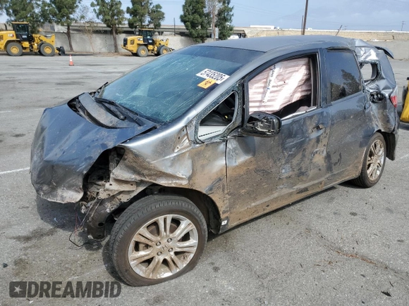 2011 Honda Fit Sport z VIN JHMGE8H52BS006399, wystawiony jako Copart lot #57435205 z przebiegiem Nie podano mil oraz Szkoda całkowita • Salvage title. Historia ofert i sprzedaży dostępna na DreamBid. Obrazek 1.