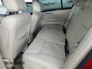 2008 Cadillac DTS 1SD z VIN 1G6KD57Y28U173094, wystawiony jako Copart lot #56895415 z przebiegiem 141 060 mil mil oraz Szkoda całkowita • Salvage title. Historia ofert i sprzedaży dostępna na DreamBid. Obrazek 10.
