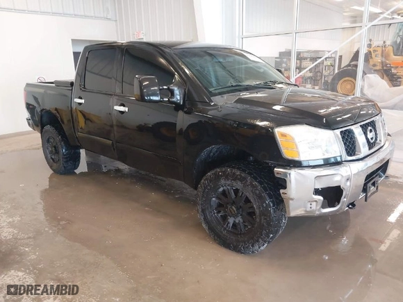 2007 Nissan Titan LE with VIN 1N6BA07B77N242856, listed as a IAAI auction lot 41496692 with 243,803 mi miles. Bid and sale history available at carsss.com. Image 1.