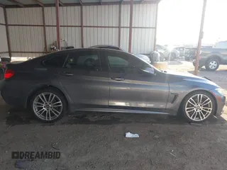 2015 BMW 4 Series 428i with VIN WBA4A5C54FG051307, listed as a IAAI auction lot 41774596 with 126,852 mi miles and . Bid and sale history available at carsss.com. Image 13.