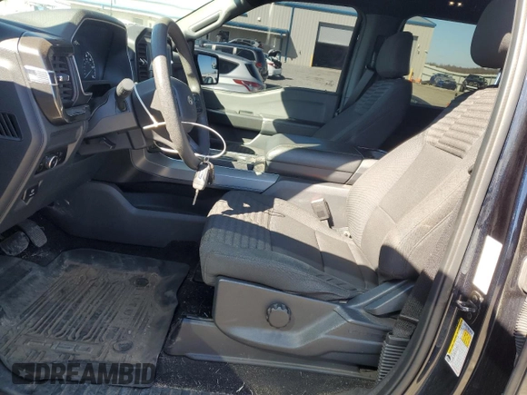 2023 Ford F-150 XL with VIN 1FTFW1E55PKD59670, listed as a Copart auction lot 48297005 with 20,668 mi miles and Salvage Title. Bid and sale history available at carsss.com. Image 7.