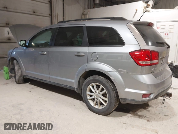 2015 Dodge Journey SXT with VIN 3C4PDDBG4FT544162, listed as a IAAI auction lot 41320028 with 128,475 mi miles and . Bid and sale history available at DreamBid. Image 3.