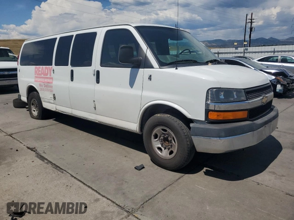 2015 Chevrolet Express Passenger LT with VIN 1GAZG1FG6F1217514, listed as a Copart auction lot 64759505 with 270,681 mi miles and Clean title. Bid and sale history available at DreamBid. Image 4.