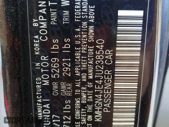 2018 Genesis G80 3.8L with VIN KMHGN4JE4JU238540, listed as a Copart auction lot 59391074 with 63,341 mi miles and Salvage Title. Bid and sale history available at carsss.com. Image 12.