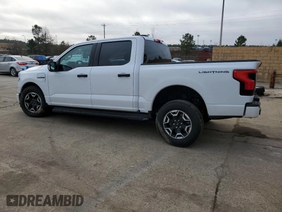 2023 Ford F-150 Lightning Pro z VIN 1FTVW1ELXPWG63466, wystawiony jako Copart lot #43397005 z przebiegiem 8 852 mil mil oraz Szkoda całkowita • Salvage title. Historia ofert i sprzedaży dostępna na DreamBid. Obrazek 2.