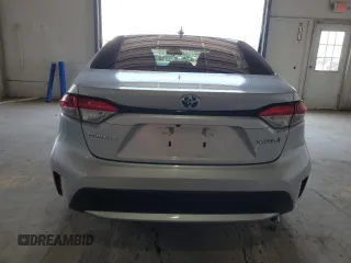 2021 Toyota Corolla Hybrid LE with VIN JTDEAMDE4MJ018825, listed as a Copart auction lot 50895965 with 93,988 mi miles and Salvage Title. Bid and sale history available at carsss.com. Image 6.