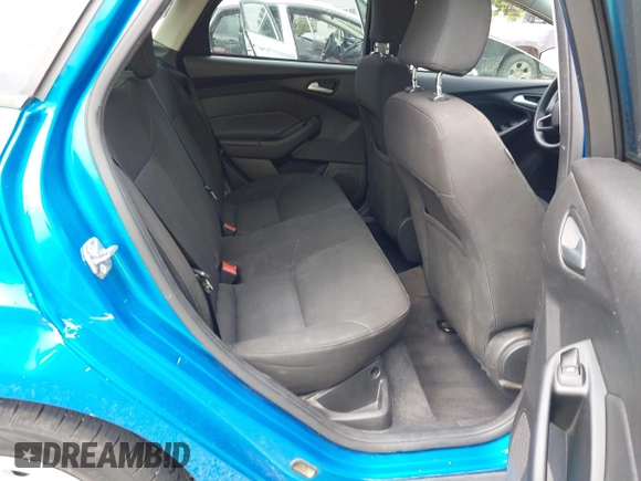 2015 Ford Focus SE z VIN 1FADP3F21FL274182, wystawiony jako IAAI lot #42441161 z przebiegiem 176 810 mil mil oraz . Historia ofert i sprzedaży dostępna na DreamBid. Obrazek 8.