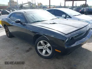 2011 Dodge Challenger with VIN 2B3CJ4DG9BH543159, listed as a IAAI auction lot 41850958 with 209,422 mi miles. Bid and sale history available at carsss.com. Image 1.