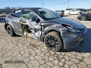 2021 Tesla Model Y Long Range with VIN 5YJYGDEE0MF088159, listed as a Copart auction lot 88668465 with 131,414 mi miles and Salvage Title. Bid and sale history available at DreamBid. Image 4.
