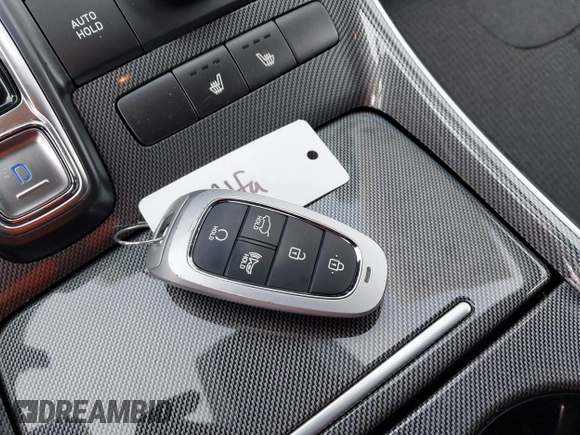 2023 Hyundai Santa Fe SEL z VIN 5NMS24AJ5PH484310, wystawiony jako IAAI lot #41842627 z przebiegiem 49 134 mil mil oraz . Historia ofert i sprzedaży dostępna na DreamBid. Obrazek 11.
