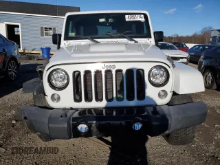 2018 Jeep Wrangler JK Unlimited Sahara with VIN 1C4BJWEG9JL863359, listed as a Copart auction lot 82865114 with 42,607 mi miles and Salvage Title. Bid and sale history available at carsss.com. Image 5.