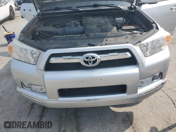 2012 Toyota 4Runner SR5 with VIN JTEBU5JR8C5097913, listed as a Copart auction lot 60094975 with 137,508 mi miles and Salvage title. Bid and sale history available at DreamBid. Image 11.