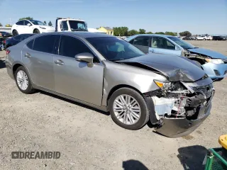 2015 Lexus ES with VIN JTHBK1GG1F2205818, listed as a Copart auction lot 52020035 with 105,899 mi miles and Salvage Title. Bid and sale history available at carsss.com. Image 4.