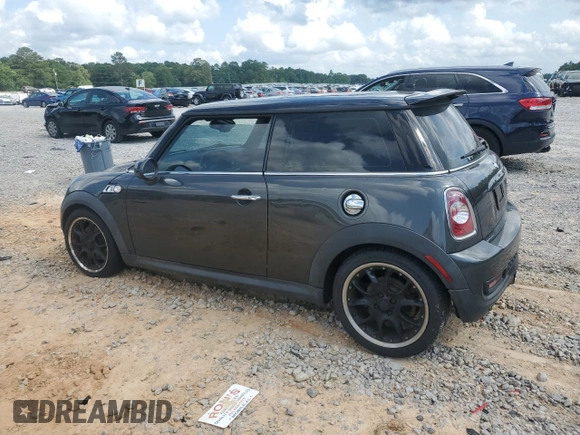 2012 MINI Hardtop S with VIN WMWSV3C50CTY18637, listed as a Copart auction lot 57771015 with 103,402 mi miles and Salvage title. Bid and sale history available at DreamBid. Image 2.