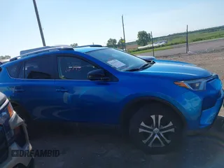 2016 Toyota RAV4 LE with VIN JTMBFREV2GD183811, listed as a IAAI auction lot 42216793 with 95,270 mi miles and . Bid and sale history available at DreamBid. Image 13.