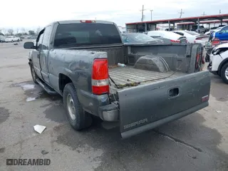2002 GMC Sierra 1500 SLE with VIN 2GTEC19T121214213, listed as a IAAI auction lot 41317517 with 209,031 mi miles. Bid and sale history available at carsss.com. Image 3.