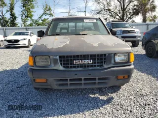 1995 Isuzu Pickup S z VIN JAACL11L8S7200788, wystawiony jako Copart lot #51145765 z przebiegiem 328 108 mil mil oraz Tytuł czysty. Historia ofert i sprzedaży dostępna na DreamBid. Obrazek 5.