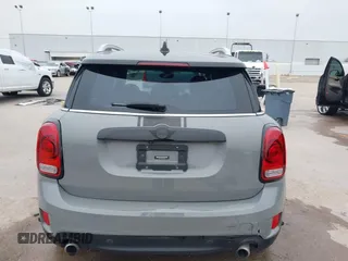 2018 MINI Countryman Cooper S z VIN WMZYT3C35J3E93291, wystawiony jako IAAI lot #41281432 z przebiegiem 58 774 mil mil oraz . Historia ofert i sprzedaży dostępna na DreamBid. Obrazek 16.