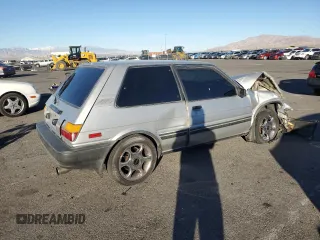 1987 Toyota Corolla с VIN 1NXAE87G6HZ400863, выставлен на аукционе Copart как лот 46637575 с пробегом 241 705 миль миль и Списание • Salvage title. История ставок и продаж доступна на DreamBid. Изображение 3.
