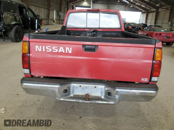 1995 Nissan Frontier with VIN 1N6SD11S6SC434201, listed as a Copart auction lot 60198815 with 222,938 mi miles and Salvage title. Bid and sale history available at DreamBid. Image 6.