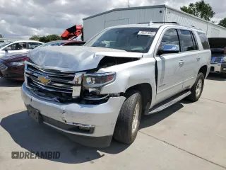 2017 Chevrolet Tahoe Premier with VIN 1GNSCCKC5HR212660, listed as a Copart auction lot 56337065 with 135,989 mi miles and Salvage title. Bid and sale history available at DreamBid. Image 1.