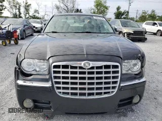 2005 Chrysler 300 C with VIN 2C3AA63H15H525775, listed as a Copart auction lot 52018135 with 59,098 mi miles and Salvage Title. Bid and sale history available at DreamBid. Image 5.