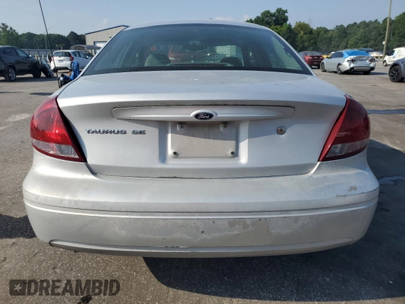 2006 Ford Taurus SE с VIN 1FAFP53UX6A124156, выставлен на аукционе Copart как лот 62056905 с пробегом 121 043 миль миль и Списание • Salvage title. История ставок и продаж доступна на DreamBid. Изображение 6.