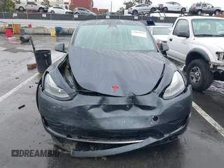 2023 Tesla Model Y Performance with VIN 7SAYGDEF0PF774282, listed as a IAAI auction lot 41807031 with Not Provided miles and . Bid and sale history available at DreamBid. Image 11.