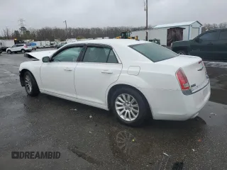 2014 Chrysler 300 with VIN 2C3CCAAG3EH182984, listed as a Copart auction lot 51958655 with 207,595 mi miles and Salvage Title. Bid and sale history available at DreamBid. Image 2.