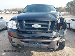 2006 Ford F-150 XLT with VIN 1FTPW04546KC98973, listed as a IAAI auction lot 41856310 with 180,394 mi miles. Bid and sale history available at carsss.com. Image 12.