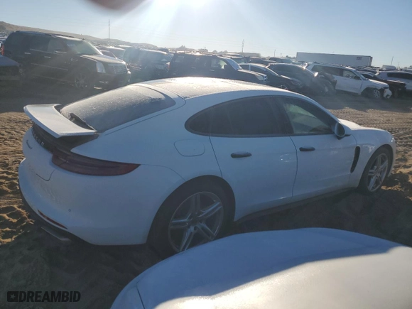 2017 Porsche Panamera with VIN WP0AA2A74HL102677, listed as a Copart auction lot 79771384 with 0 mi miles and Salvage Title. Bid and sale history available at carsss.com. Image 3.