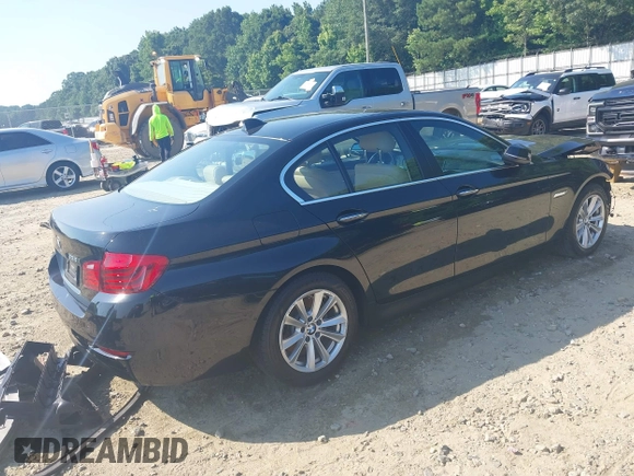 2015 BMW 5 Series 528i with VIN WBA5A5C52FD518794, listed as a IAAI auction lot 42571091 with 165,744 mi miles and . Bid and sale history available at DreamBid. Image 4.