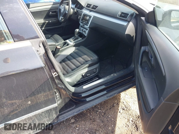 2013 Volkswagen CC Sport with VIN WVWBN7AN6DE509497, listed as a IAAI auction lot 41854748 with 208,227 mi miles and . Bid and sale history available at DreamBid. Image 5.