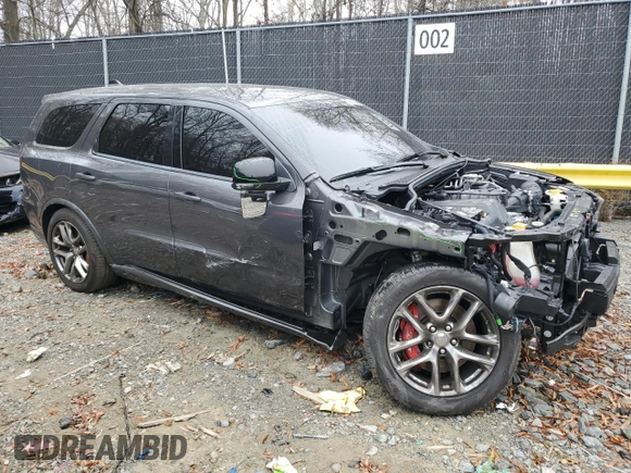 2023 Dodge Durango SRT 392 Premium with VIN 1C4SDJGJ1PC657822, listed as a Copart auction lot 83649154 with 16,952 mi miles and Salvage Title. Bid and sale history available at DreamBid. Image 4.